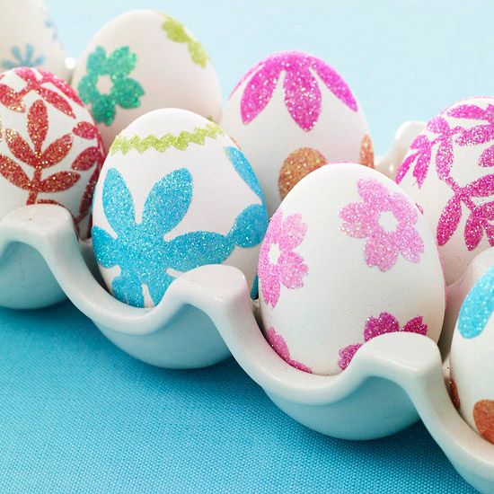 Easter eggs decorated with colorful flowers– Easter Basket and Eggs Ideas for Decorations in Many Colors